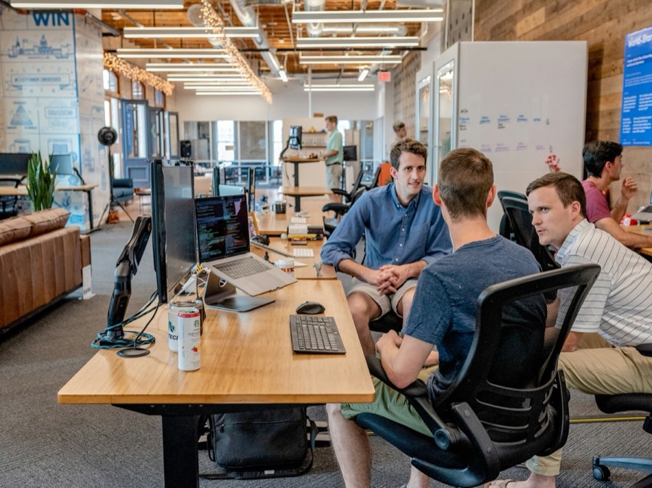 Revenue management team reviewing pricing performance